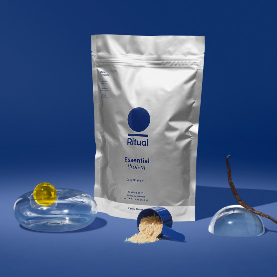 Photo of Ritual Essential Protein photographed against a blue backdrop