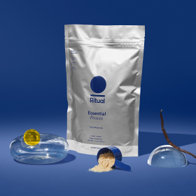 Photo of Ritual Essential Protein photographed against a blue backdrop
