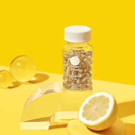 Photo of Ritual Essential Prenatal multivitamins against a yellow backdrop