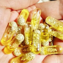 Instagram image showing Ritual's Essential for Women 18+ multivitamin capsules piled in hand